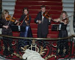 Cuarteto de violines.