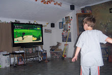 spencer playing golf on our new wii game!!