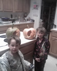 mckenzie and spencer with their pumpkins.