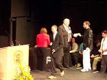 daniel recieving his medal at graduation