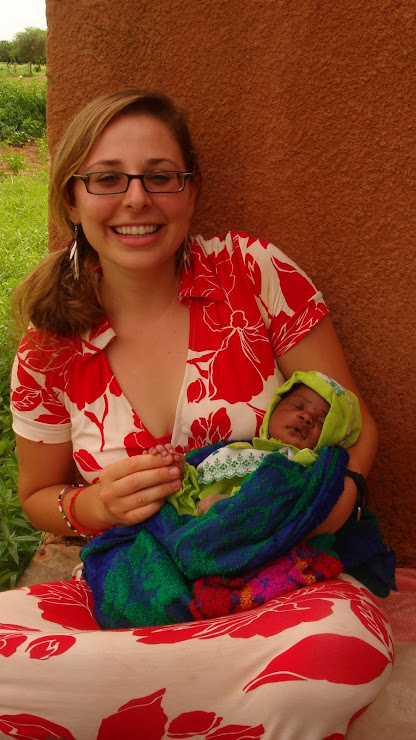 Holding Baby Megan, Komsilga