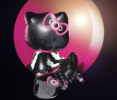 Soft black pleather 14" Hello Kitty doll in a 60&squot;s style black & white dress Soft black pleather 14" Hello Kitty doll in a 60&squot;s style black & white dress