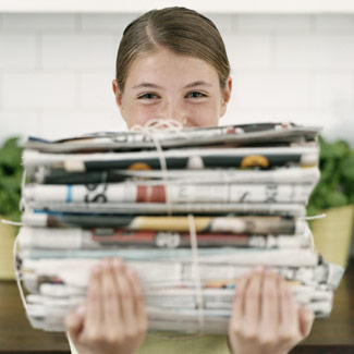 [girl-with-bundled-newspapers.jpg]