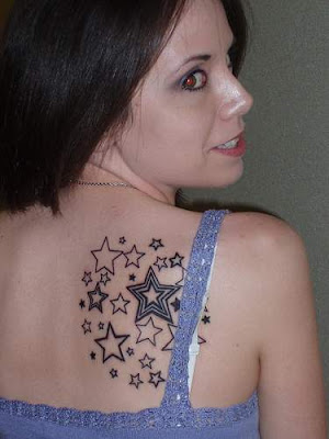 upper back tattoos. upper back star tattoos