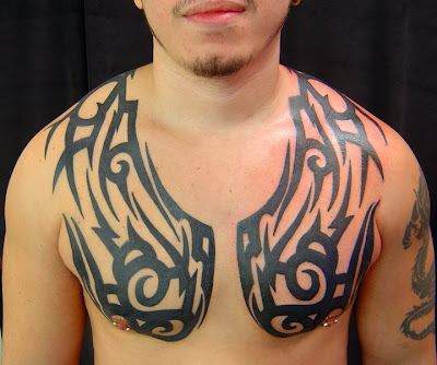 tattoo chest piece. chest piece tattoos. tribal