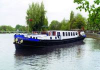 Hotel Barge Magna Carta cruises the River Thames in England. Contact Paradise Connections for booking details.