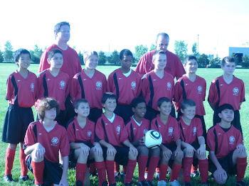 Dawson's new soccer team. He is kneeling in the front left corner.
