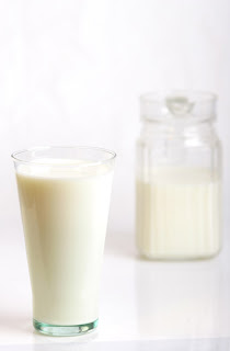 glass and jug of milk