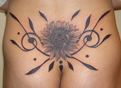 Sunflower Tattoo Design on Lower Back area