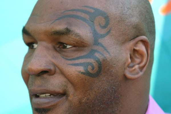Mike Tyson Tribal Tattoo. Random Tattoo Quote: "It's only his outside;