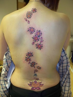 female back tattoo. Lower Back Tattoo Pictures