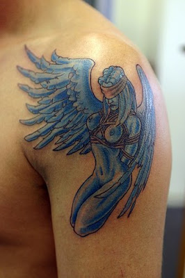 angel tribal tattoo on shoulder