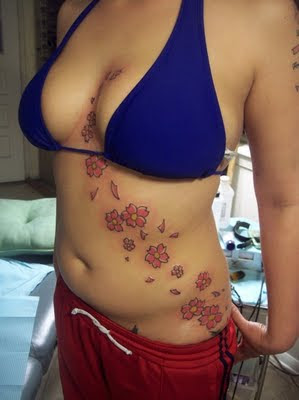 Flower Tattoo on Hot Girl Chest and Side Body