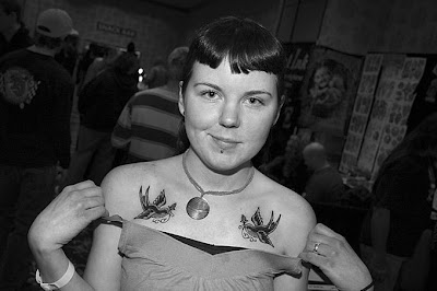 Tattooed Women Bird Tattoo Design on Chest