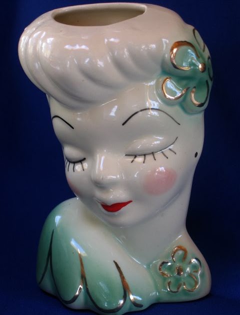 vintage doll head vases