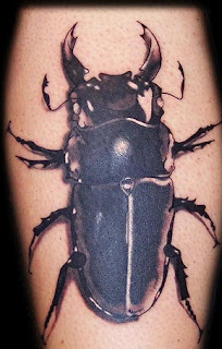 Black and Grey Bug Tattoo Picture