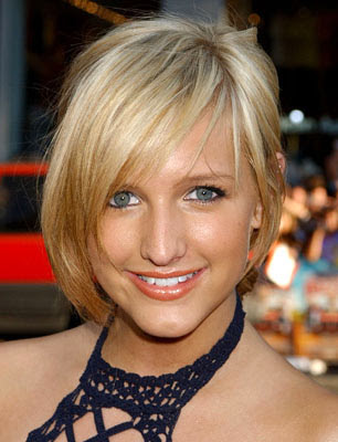 summer haircut with side swept bangs and braid. Celebrity short hairstyles.