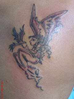 foto tatuagem anjo e passaro