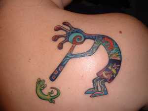 tatuagem Kokopelli e lagarto