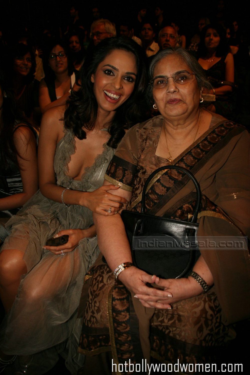 Butt Cleavage and Sexy Model: Mallika Sherawat No Bra or Cobra