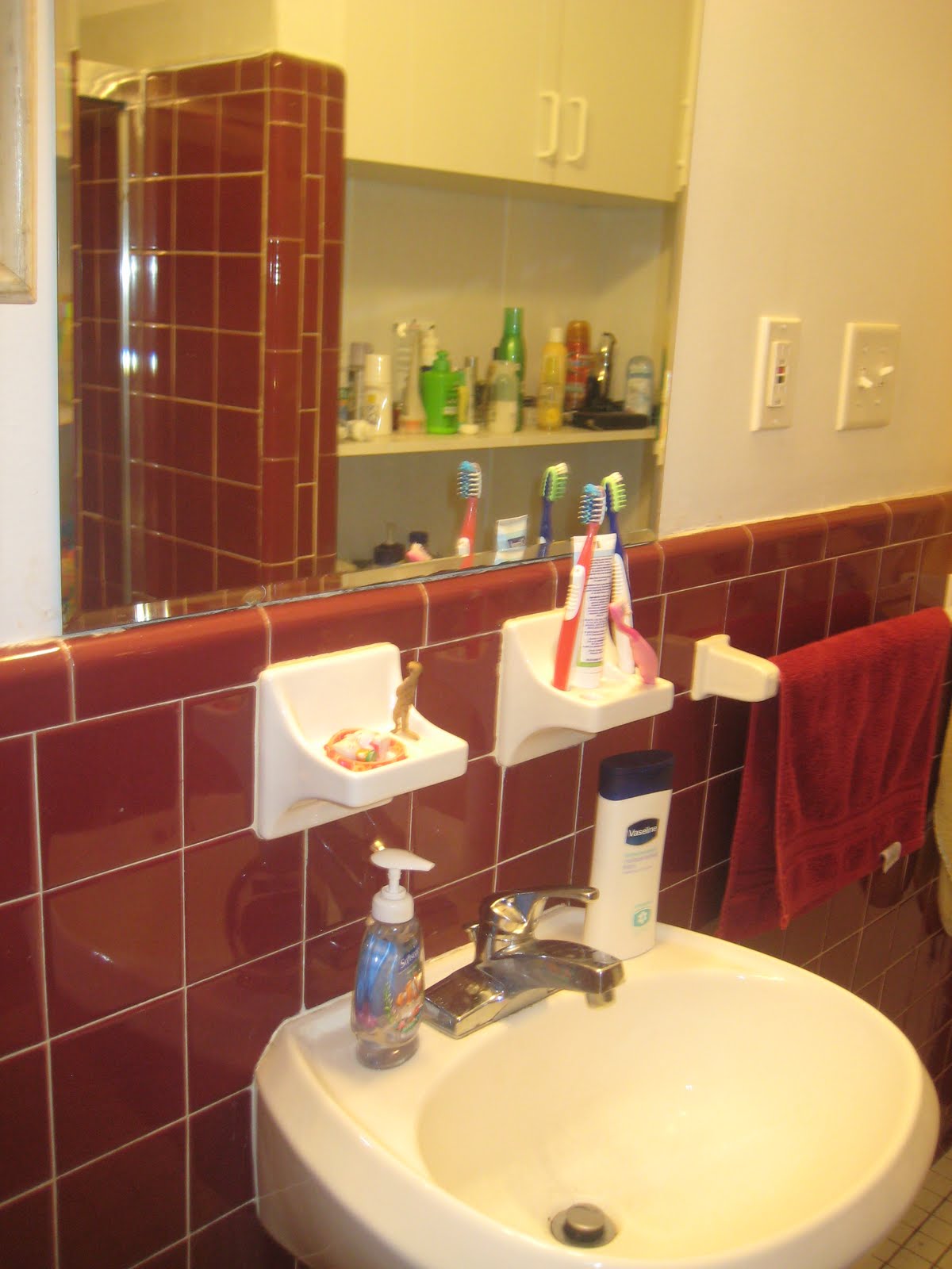 Atomic Lilly Ranch UGLY bathroom with ugly photos)