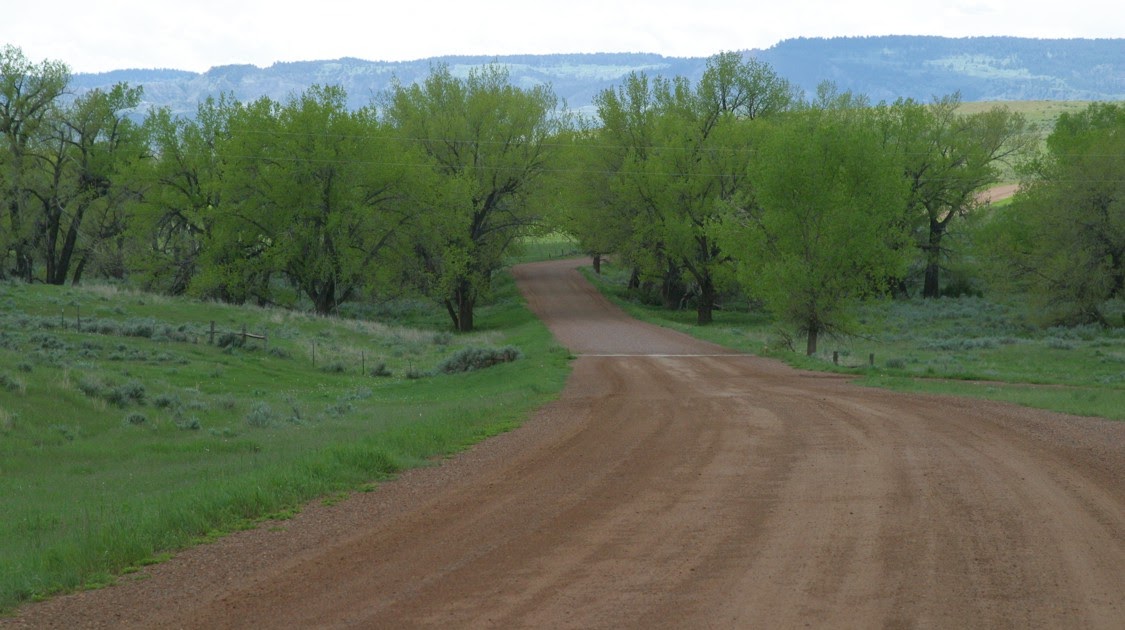 The Old House in Texas Red dirt road...
