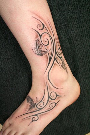 foot tattoos for women. foot tattoo ideas. tribal foot