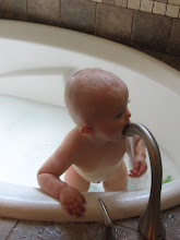 Krew getting a drink during his bath!