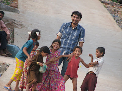 Jigar with the street urchins at Buddha Temple, Hyderabad