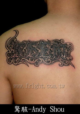 Letters tattoo on the back with cloud