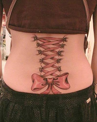 bow tattoo on the back