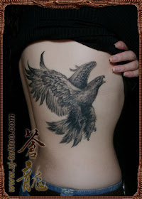 a girl with an eagle tattoo