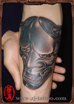 Demon tattoo design on the leg