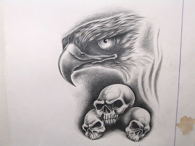 A free tattoo flash combining eagle and skulls