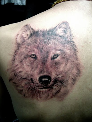 Another tattoo with wolf. This tattoo obviously requires a lot of body Another tattoo with wolf. This tattoo obviously requires a lot of body