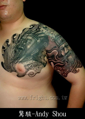 A portrait tattoo covering half shoulder and half chest.