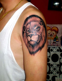 Lion tattoo design on the arm