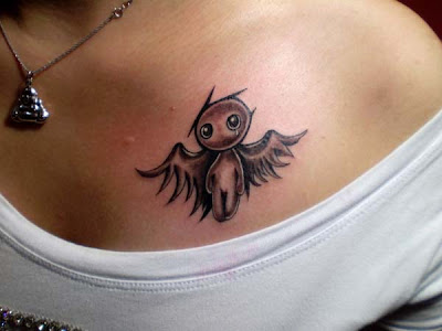 A very cute angel tattoo design for girls. Actually, more like a combination 
