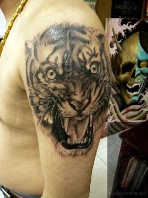tiger tattoo design A cute tiger free tattoo design.