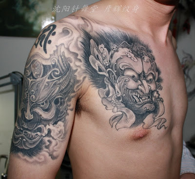 human head dragon body tattoo design on the shoulder
