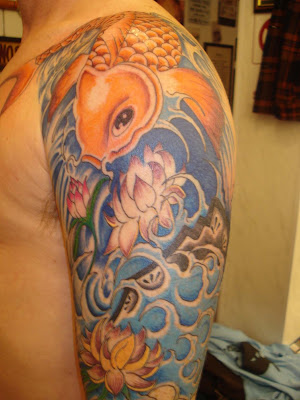 the preferred places for female wearers of the Japanese Koi fish tattoo.