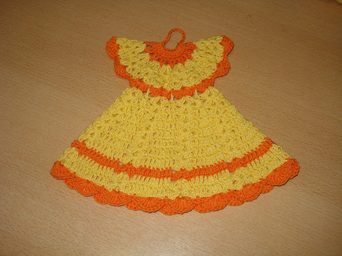 agarradera vestido en naranja y amarillo $6