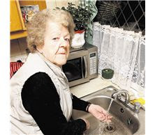 granny with tap water