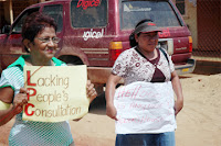 ladies with a sign