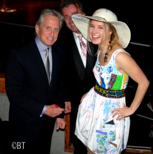 MICHAEL DOUGLAS Happy to sign the hat , at the Drama Desk Awards in New York