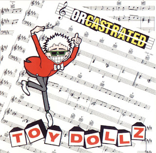 L UNLEASHED Toy+dolls-orcastrated-front