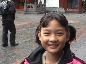 Age 10 at Shanghai