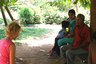 This is me writing down some ancient Ngobe legends as told in Ngobere by an elder.  You can't see Plinio.  He is to the right in a hammock translating the Ngobere into Spanish for me.  He is smiling and laughing about how interestingly difficult to translate because the structures of the languages is so different