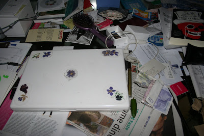 Laptop and chili pepper on MsMarmitelover's desk