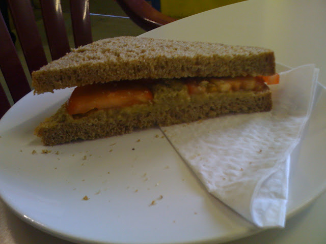 aubergine paté and tomato brown bread sandwich